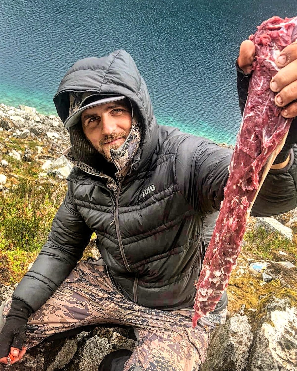 Mountain Goat Hunted in Northern BC Bolen Lewis Guide displaying a beautiful goat back-strap. Goat is great table fair and we use every bit.